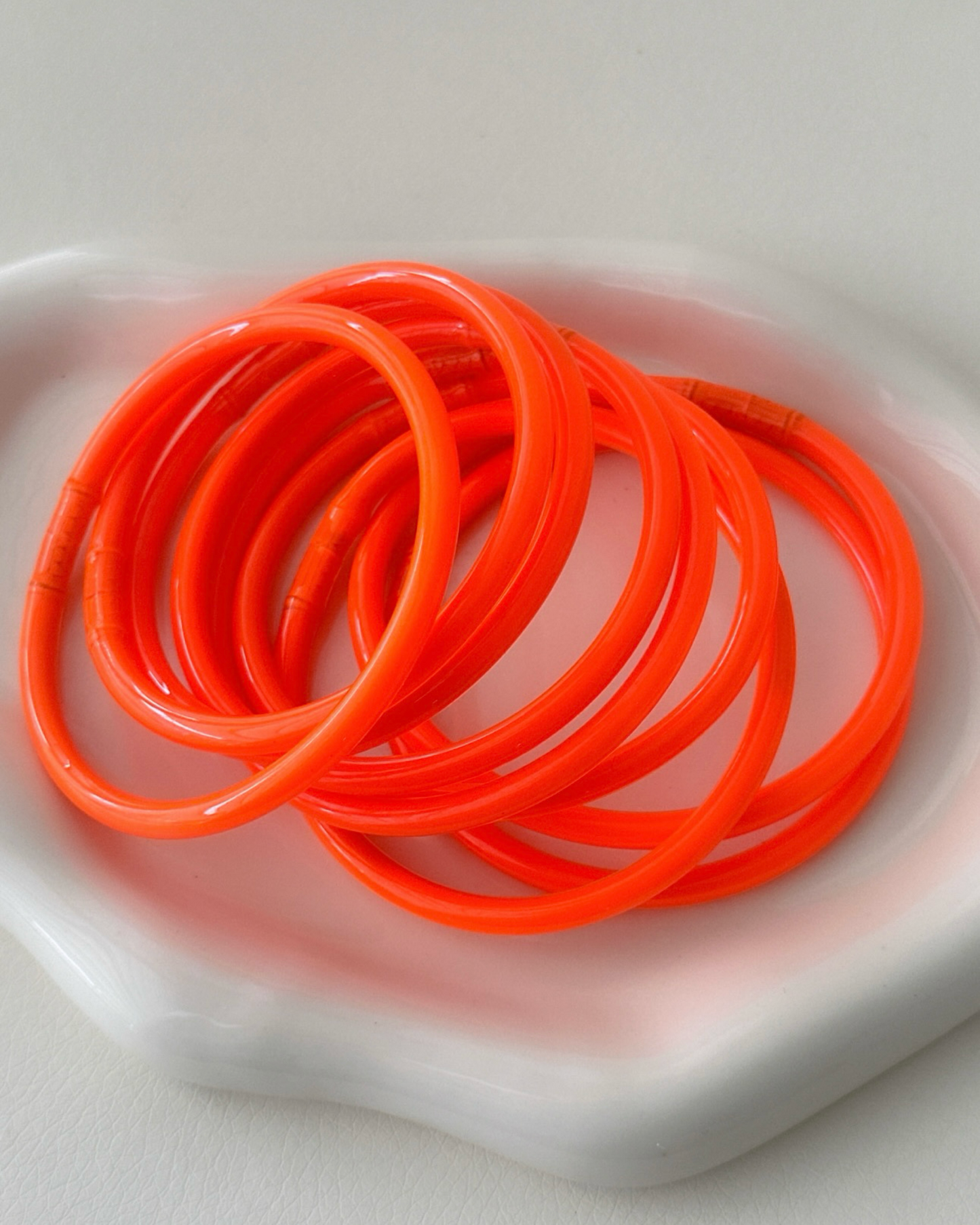 NEON ORANGE JELLY BANGLES